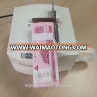 Mini binder machine for binding banknotes/currency/money